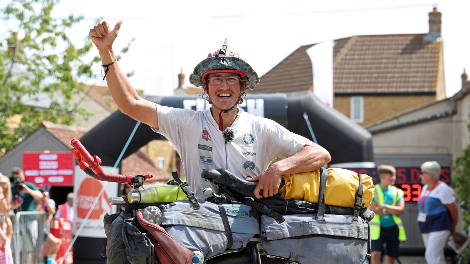 Ed Pratt is first person to unicycle around the world as he passes