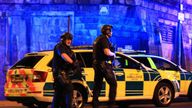 Armed police at Manchester Arena after an explosion at the venue during an Ariana Grande gig