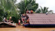 Villagers evacuate after the Xepian-Xe Nam Noy hydropower dam collapsed in Laos