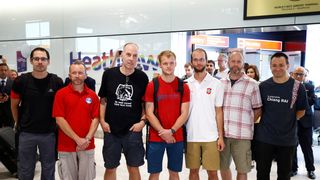 British cave divers, Rick Stanton, Chris Jewell, Connor Roe, Josh Bratchley, Jim Warny, Mike Clayton and Gary Mitchell, arrive back at Heathrow Airport, having helped in the rescue of the 12 boys in Thailand