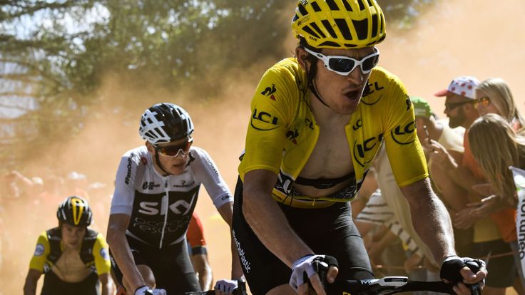 Geraint Thoms wears the overall leader's yellow jersey and Chri Froome is in the black and white Sky jersey