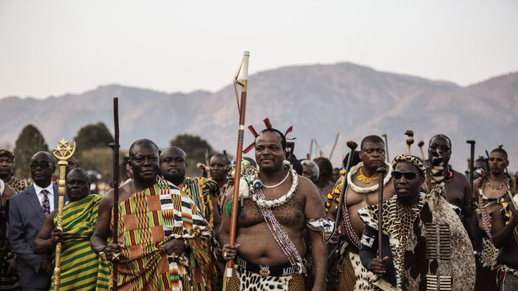 King Mswati III (C) on the first day of the annual royal reed dance in 2015