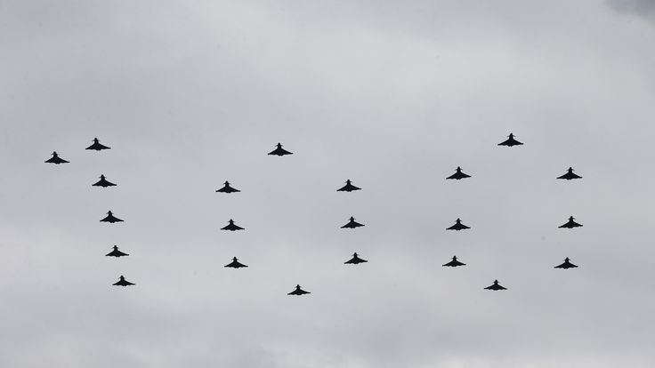 A flypast by 22 Typhoons spells out the number 100