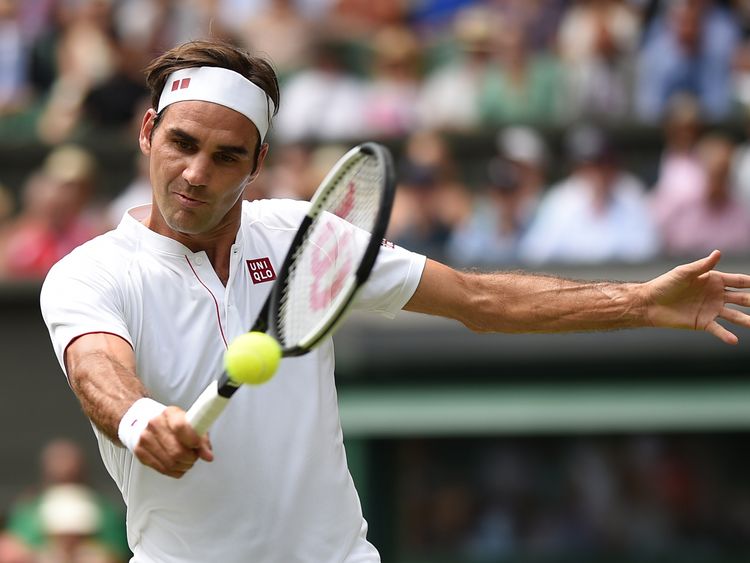 Roger Federer in fourth-round action on centre court