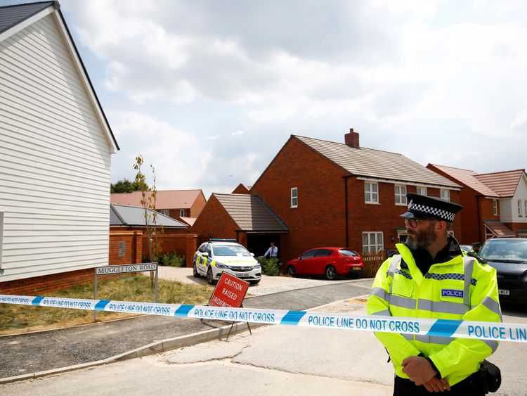 Police guard entrance to housing estate on Muggleton Road, Amesbury