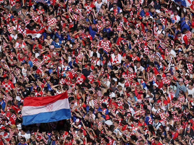 Joyful crowds await to greet the Croatia football team in the country's capital