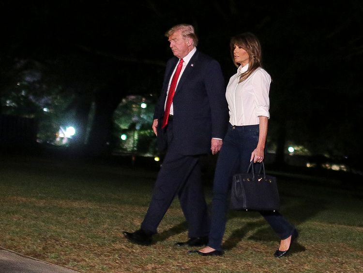 Donald and Melania Trump return to the White House after the summit in Helsinki with Vladimir Putin