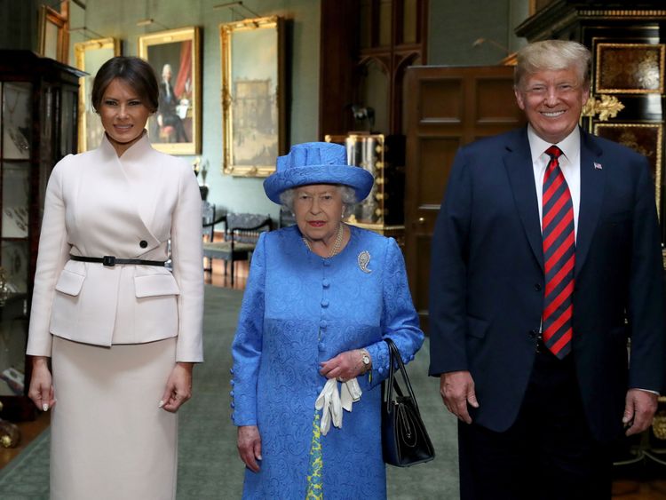 Queen Elizabeth II stands with US President Donald Trump and his wife, Melania, during their visit to Windsor Castle 