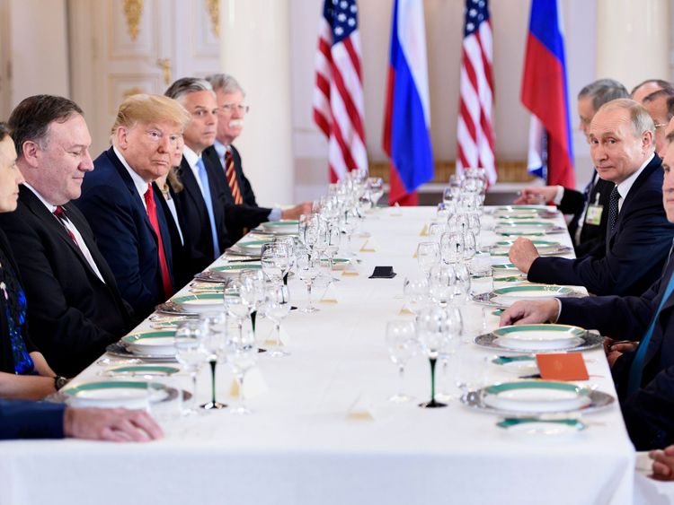 US President Donald Trump (3L), Russia's President Vladimir Putin (2R) and others wait for a working lunch meeting at Finland's Presidential Palace on July 16, 2018 in Helsinki, Finland. - The US and Russian leaders opened an historic summit in Helsinki, with Donald Trump promising an 'extraordinary relationship' and Vladimir Putin saying it was high time to thrash out disputes around the world. (Photo by Brendan Smialowski / AFP) (Photo credit should read BRENDAN SMIALOWSKI/AFP/Getty Images) 