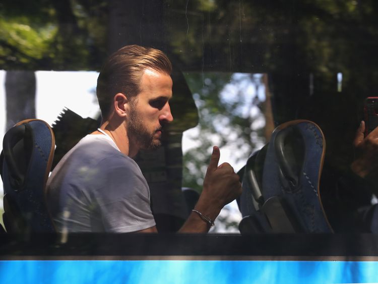 England captain Harry Kane gives a thumbs up as the team leave their hotel in Russia