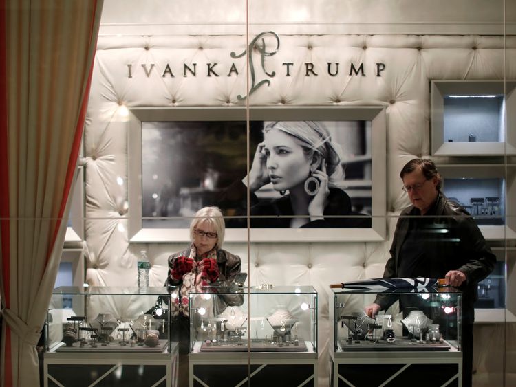 People look at items for sale in the Ivanka Trump shop inside Trump Tower, New York