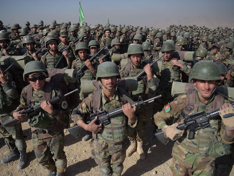 Afghan National Army (ANA) soldiers march during a military exercise at the Kabul Military Training Centre (KMTC) on the outskirts of Kabul on October 17, 2017