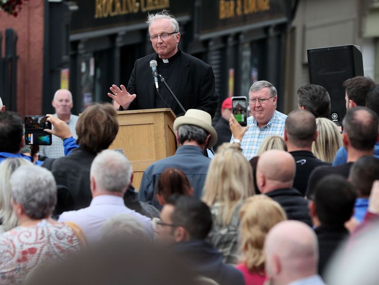 Catholic bishop of Derry Donal McKeown speaking at a rally on Fahan street, Londonderry, in protest against the ongoing violence and disorder