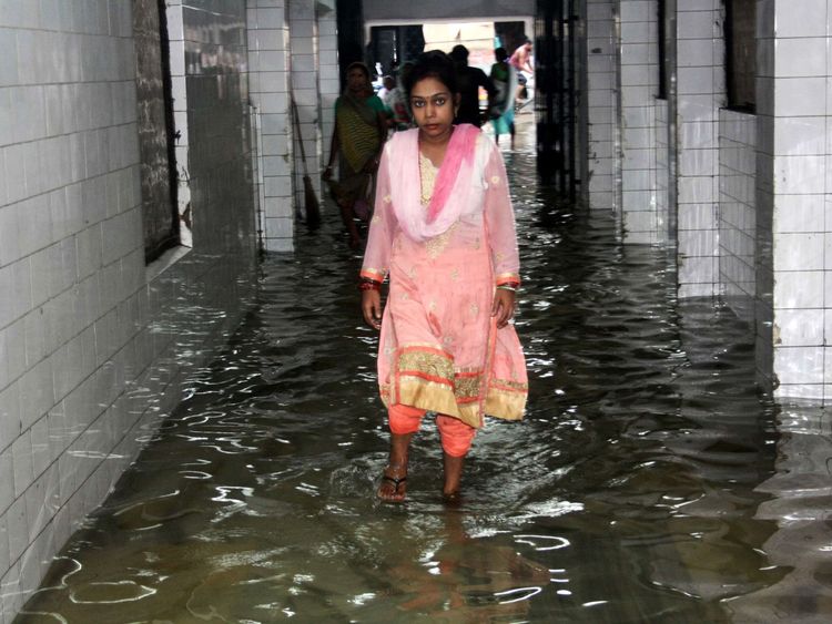 Rain has flooded hospitals and public building across India