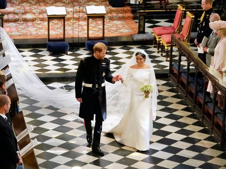 The Duke and Duchess of Sussex leave St George's Chapel after their wedding ceremony