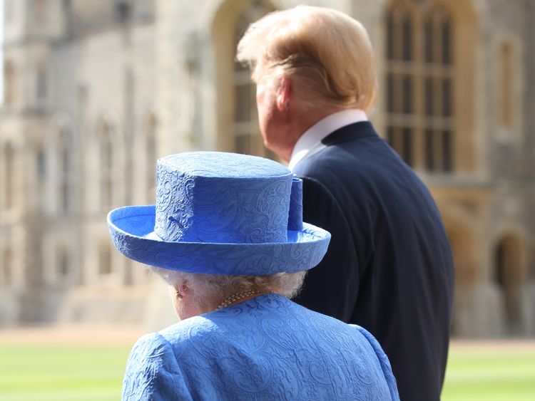 US President Donald Trump and Queen Elizabeth II walk in the Quadrangle at Windsor Castle