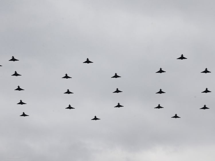 A flypast by 22 Typhoons spells out the number 100