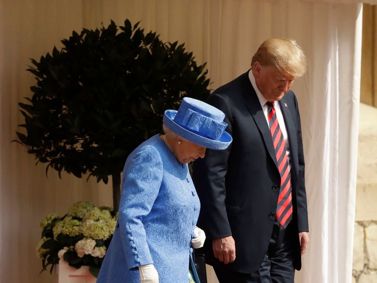 US President Donald Trump and Queen Elizabeth II prepare to inspect a Guard of Honour, formed of the Coldstream Guards, at Windsor Castle, Windsor