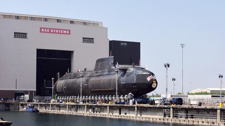The first Astute class nuclear submarine is brought out of the Devonshire Dock Hall at the BAE Systems production plant in Barrow-in-Furness, north west England, 08 June 2007. The new submarine which is the first of four was named HMS Astute by Camilla, Duchess of Cornwall. Those that follow will be HMS Ambush, HMS Artful and HMS Audacious.