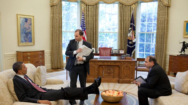 U.S. President Barack Obama talks with Deputy National Security Advisor for Strategic Communication Ben Rhodes