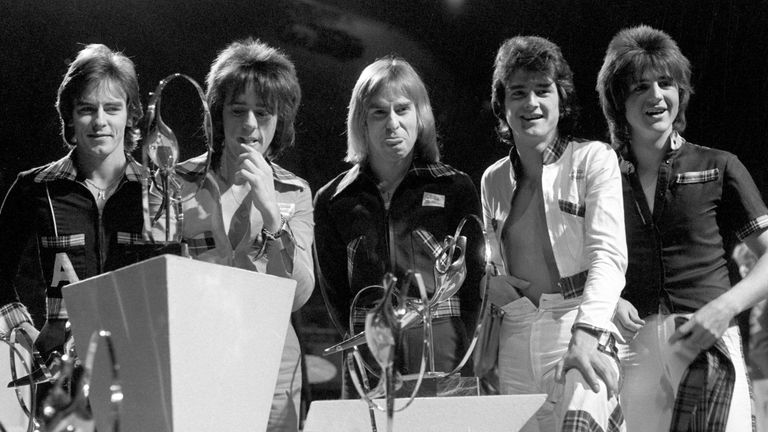 Alan Longmuir (left) with the Bay City Rollers at an awards show in Wembley in 1975