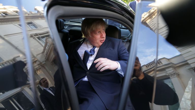 British Foreign Secretary Boris Johnson (C) gets into a car as he leaves after attending an event at the French Ambassador&#39;s residence in west London on July 14, 2016. Britain&#39;s new Prime Minister Theresa May showed several of her former cabinet colleagues the door Thursday, including top Brexit campaigner Michael Gove, while fellow &#39;Leave&#39; supporter Boris Johnson was crowned top diplomat. / AFP / DANIEL LEAL-OLIVAS (Photo credit should read DANIEL LEAL-OLIVAS/AFP/Getty Images)