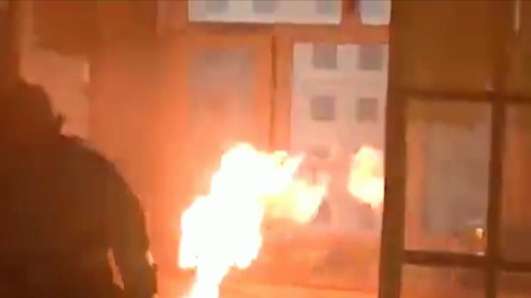 Fire fighters in China successfully remove and extinguish a flaming gas tank