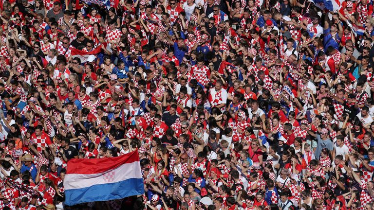 Joyful crowds await to greet the Croatia football team in the country&#39;s capital
