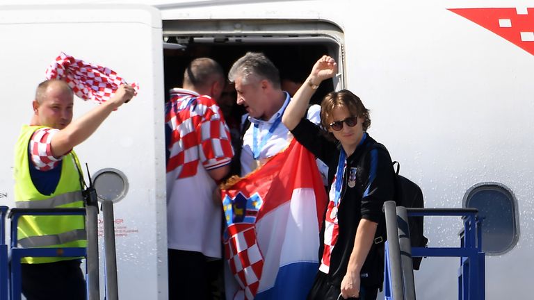 Luka Modric touches down in Zagreb along with the rest of the team