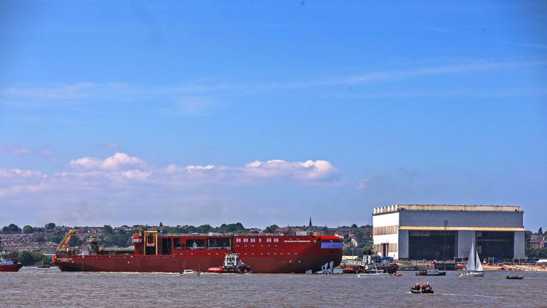 The RRS Sir David Attenborough polar research ship&#39;s hull is launched in the River Mersey in Liverpool