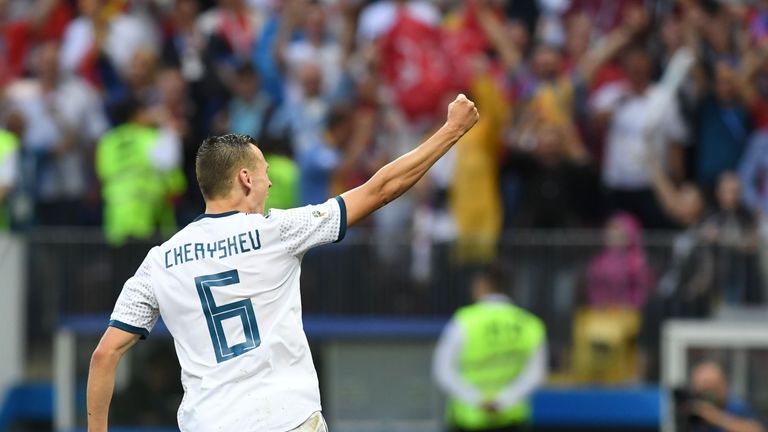 Midfielder Denis Cheryshev celebrates after scoring in the shoot-out