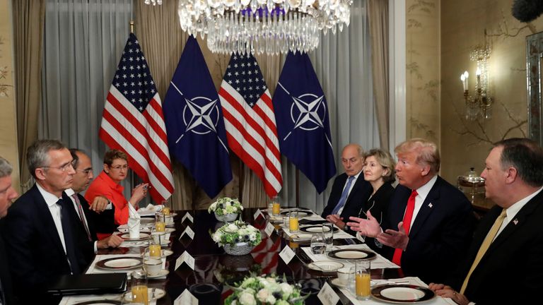 Donald Trump and NATO Secretary General Jens Stoltenberg attend a bilateral breakfast ahead of the NATO Summit in Brussels