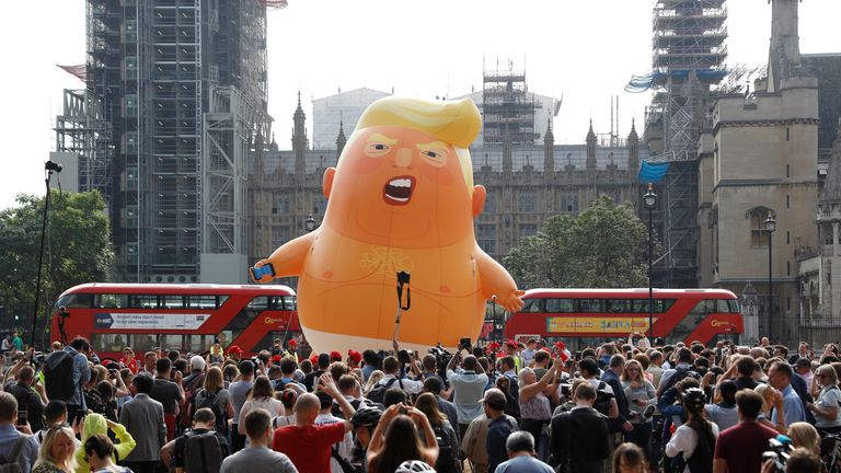 Demonstrators fly a blimp portraying U.S. President Donald Trump, in Parliament Square