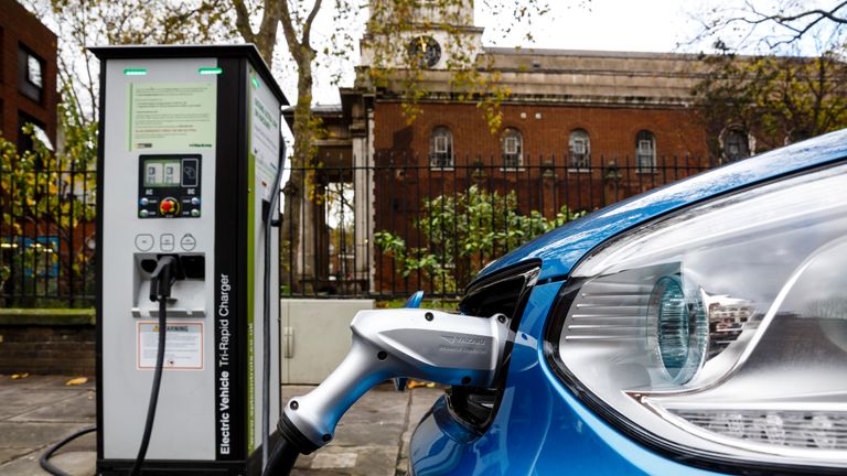 A Go Ultra Low Kia Soul EV on charge on a London street