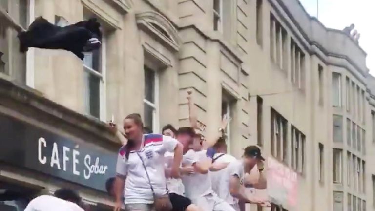 Fans celebrates a quarter final win against Sweden at O2 Academy in Nottingham, Britain July 7, 2018, in this picture grab obtained from social media video. Twitter/Andrew Sheard/ via REUTERS THIS IMAGE HAS BEEN SUPPLIED BY A THIRD PARTY. MANDATORY CREDIT. NO RESALES. NO ARCHIVES.