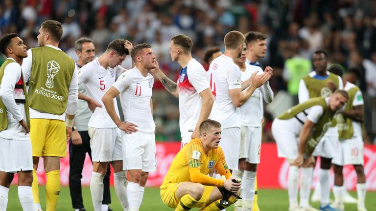 Dejected England fans after their semi-final loss