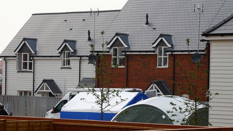 Forensic tents at the back of a housing estate in Amesbury