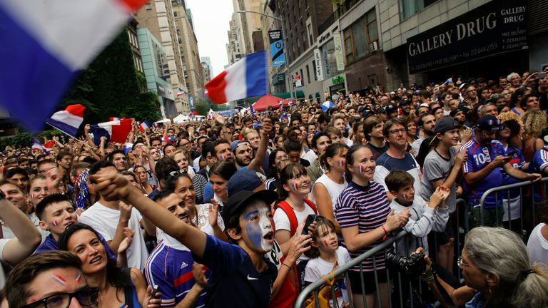 French fans gather as they watch the World Cup final match between France vs Croatia on July 15, 2018 in New York. - The World Cup final between France and Croatia in Moscow brings the curtain down on a month-long festival of football that has changed perceptions of the host country while also giving hope to the underdog on the field. (Photo by KENA BETANCUR / AFP) (Photo credit should read KENA BETANCUR/AFP/Getty Images)
