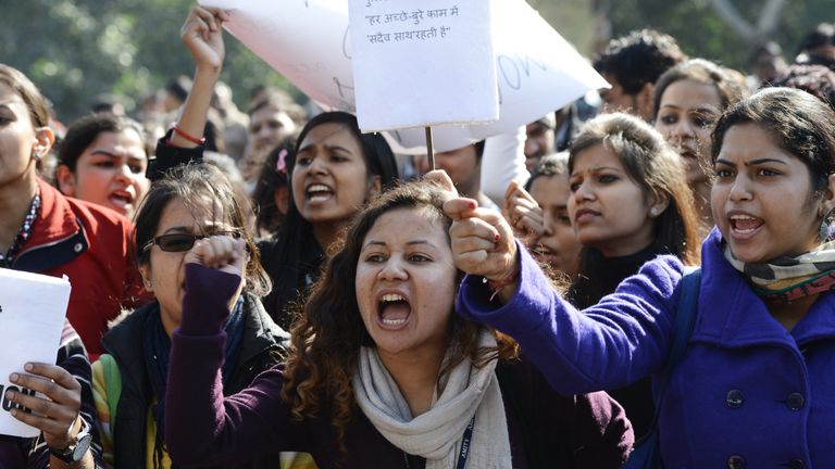 Indian activists shout slogans outside police headquarters during a protest in New Delhi following the gang-rape of Jyoti Singh