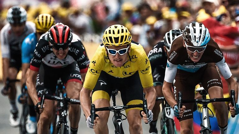 Geraint Thomas (C) during the 19th stage of the 105th edition of the Tour de France 
