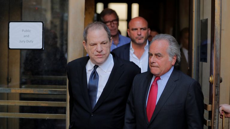 Harvey Weinstein leaves with his lawyer Benjamin Brafman after his arraignment hearing at Manhattan Criminal Court in New York City