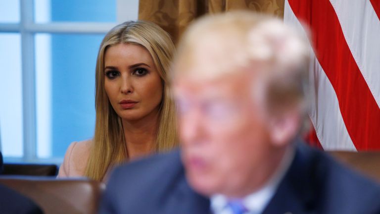 Ivanka Trump listens to her father Donald