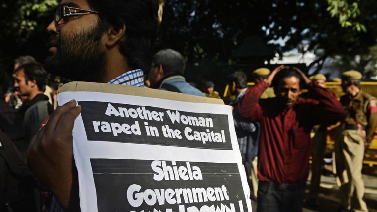 Indian students gather outside the residence of Delhi Chief Minister Sheila Dikshit as they protest against the gang-rape of Jyoti Singh