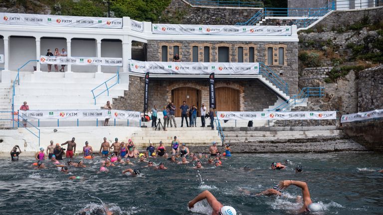 Swimmers jump in at Tinside Beach in Plymouth