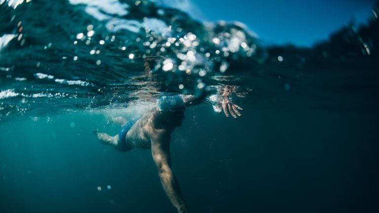 Lewis Pugh is swimming in cold waters