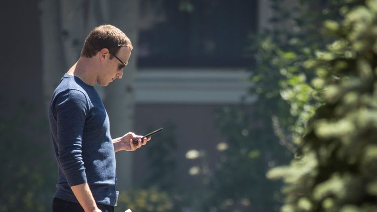 SUN VALLEY, ID - JULY 13: Mark Zuckerberg, chief executive officer of Facebook, checks his phone during the annual Allen & Company Sun Valley Conference, July 13, 2018 in Sun Valley, Idaho. Every July, some of the world&#39;s most wealthy and powerful businesspeople from the media, finance, technology and political spheres converge at the Sun Valley Resort for the exclusive weeklong conference. (Photo by Drew Angerer/Getty Images)
