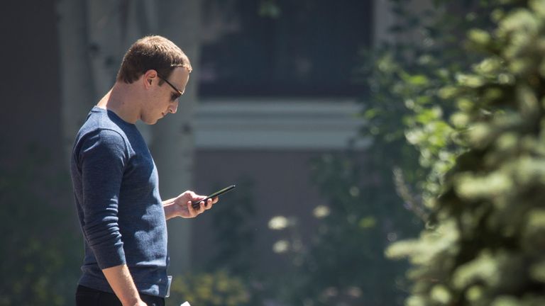 SUN VALLEY, ID - JULY 13: Mark Zuckerberg, chief executive officer of Facebook, checks his phone during the annual Allen & Company Sun Valley Conference, July 13, 2018 in Sun Valley, Idaho. Every July, some of the world&#39;s most wealthy and powerful businesspeople from the media, finance, technology and political spheres converge at the Sun Valley Resort for the exclusive weeklong conference. (Photo by Drew Angerer/Getty Images)
