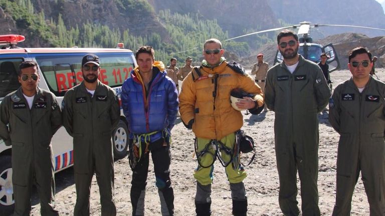 Timothy Miller (left) and Bruce Normand with their rescuers 