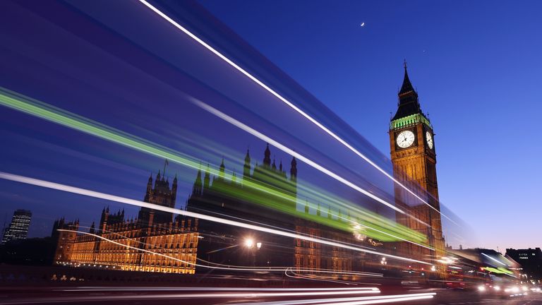 LONDON, ENGLAND - MARCH 27: A bus travels along Westminster Bridge past the Houses of Parliament on March 27, 2012 in London, England. (Photo by Oli Scarff/Getty Images)
