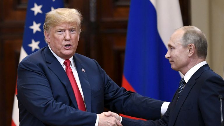U.S. President Donald Trump and Russia&#39;s President Vladimir Putin shake hands after their joint news conference in the Presidential Palace in Helsinki, Finland